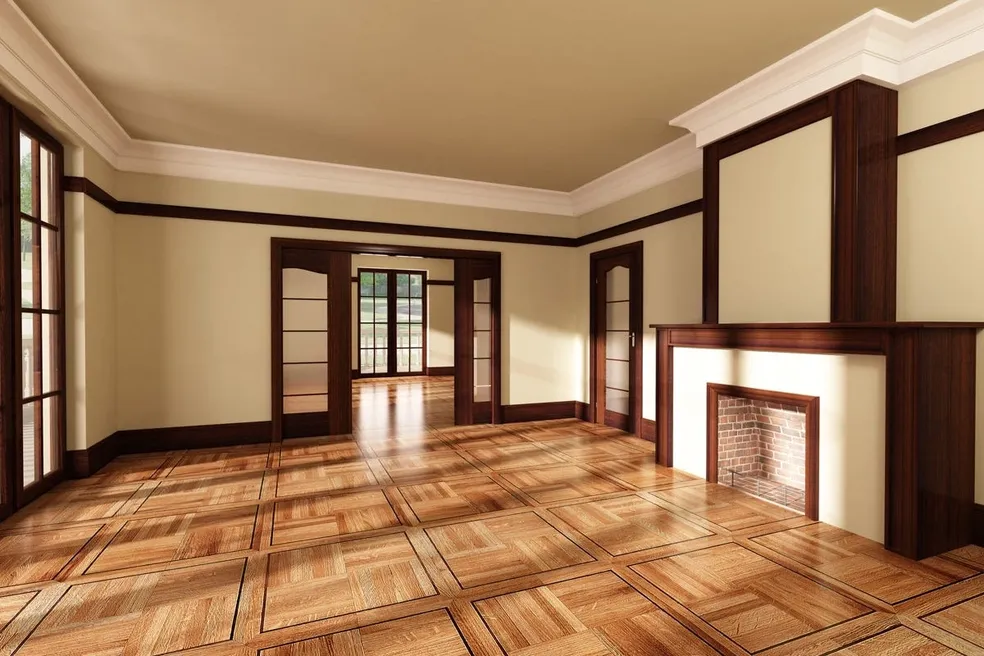 Interior room with parquet hardwood flooring, dark wood trim, and fireplace