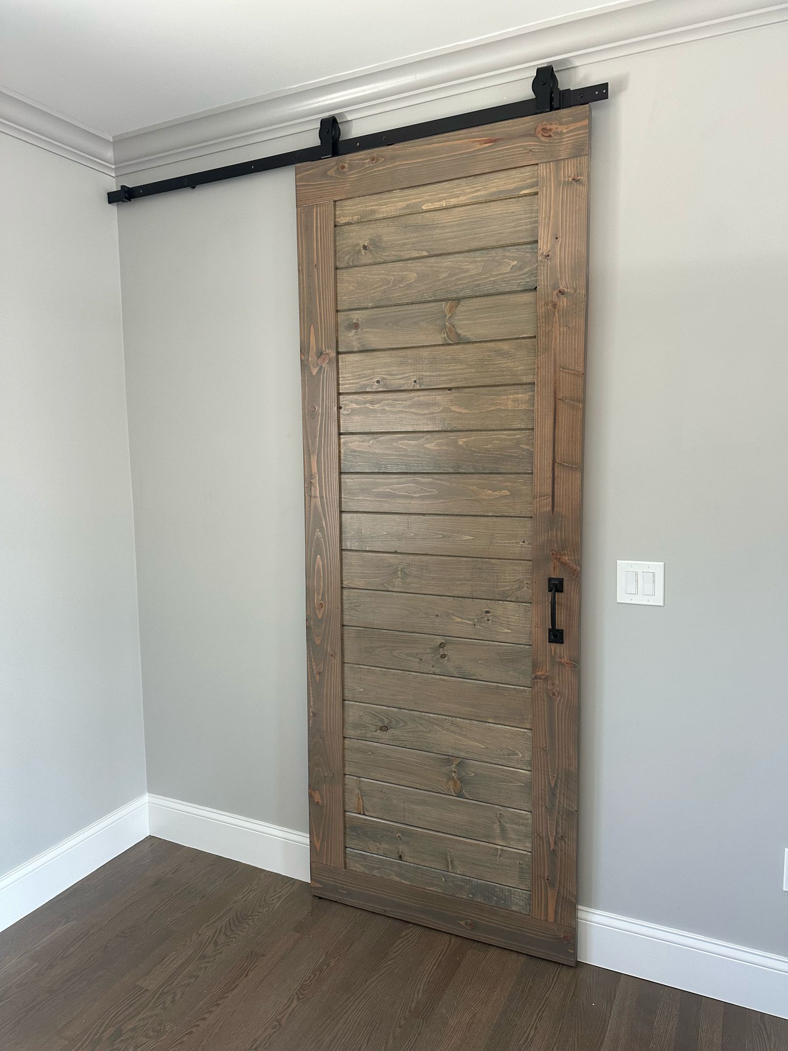 Rustic barn door with sliding hardware