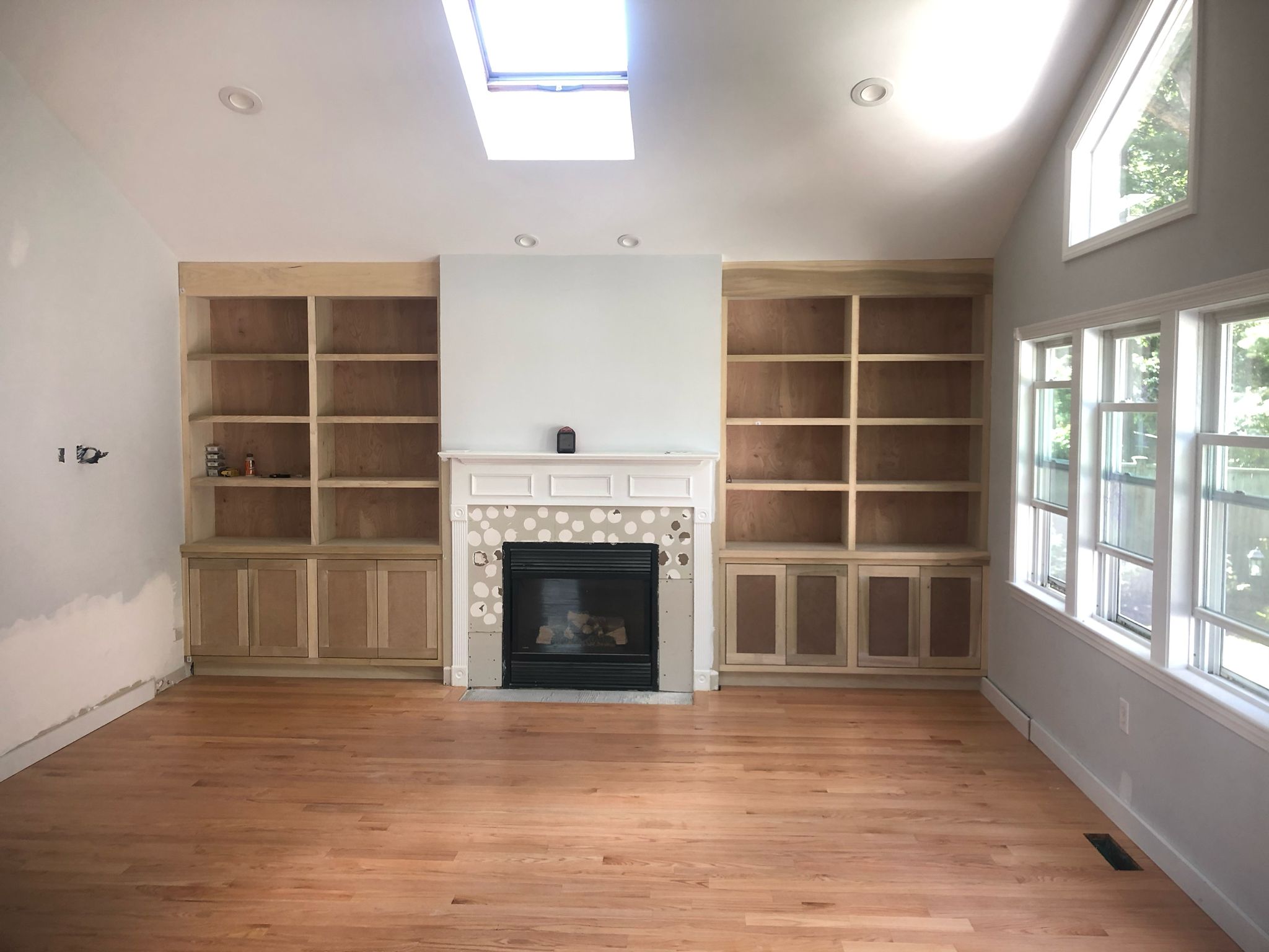 Custom built-in shelving around fireplace