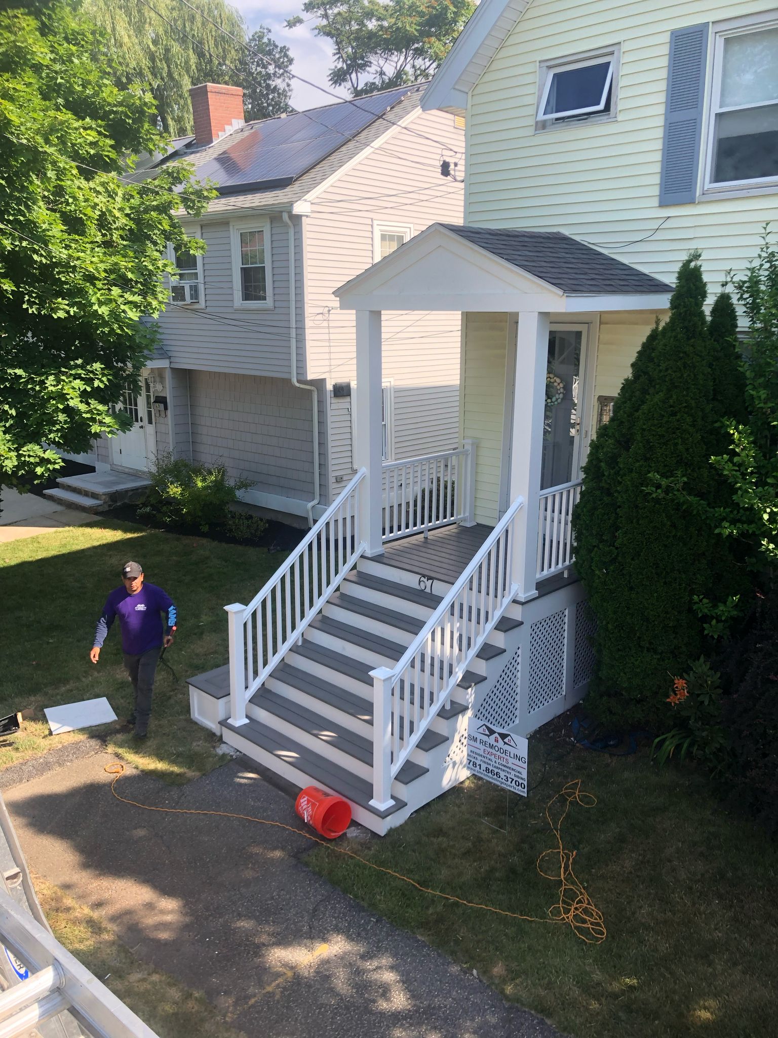 Completed front porch with covered portico and stairs