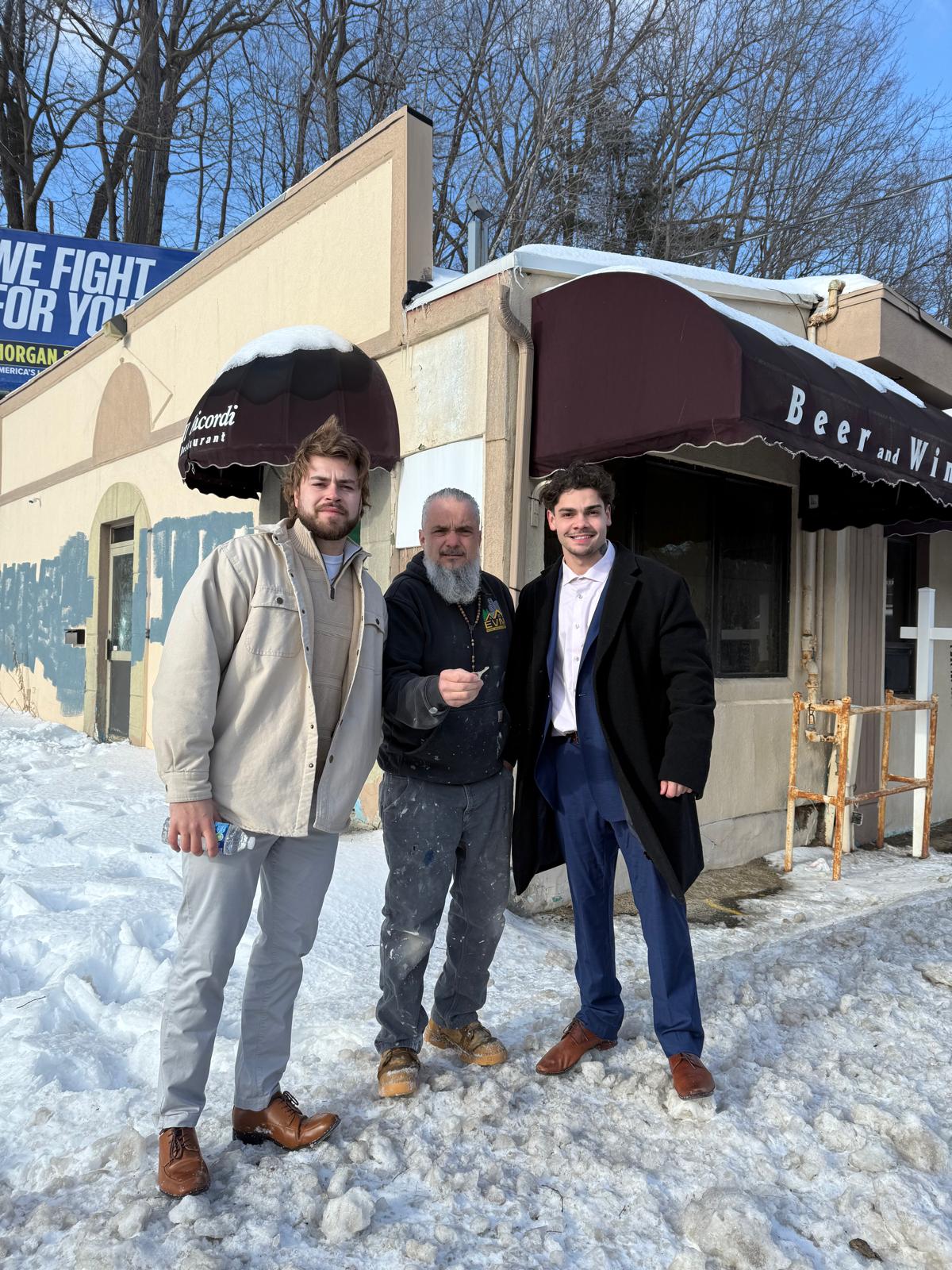 Durval Elias with team at construction site