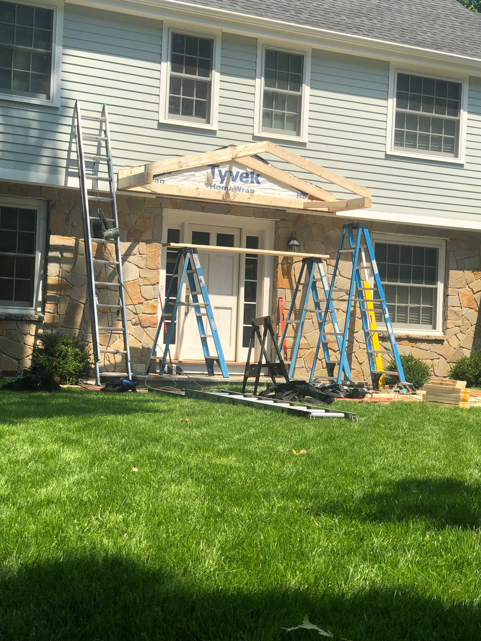 Porch portico framing construction in progress